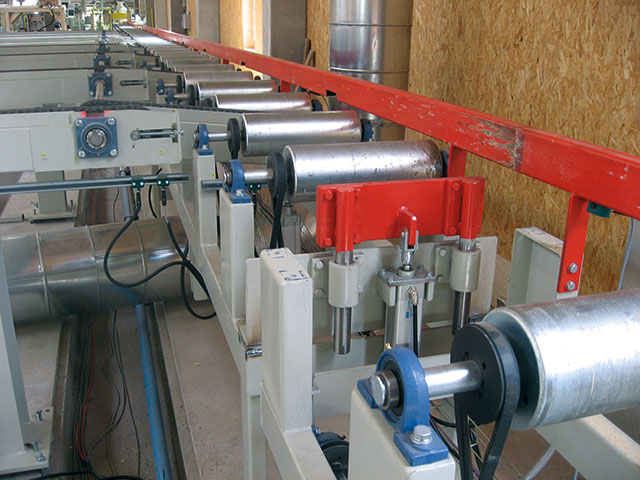 Conveyors for construction-timber